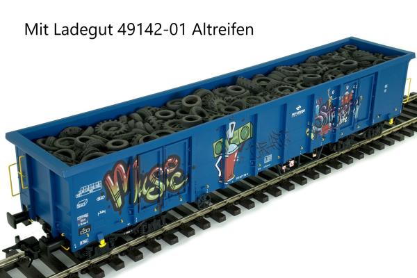 Hochbordwagen Eanos, PKP, blau, Graffiti mit Ladegut Altreifen
